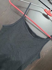 Sleeveless Black Peplum Top