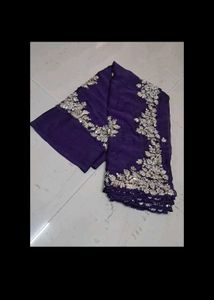 Elegant Purple Saree with Silver Embellishments
