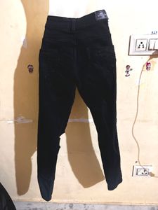 Distressed Black Denim Jeans