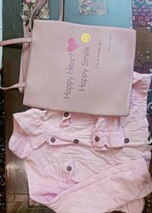 Denim jacket with pink bag