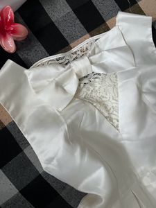 Pretty White Dress With Back Bow Design