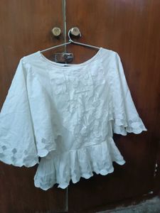 Off White Peplum Top
