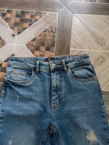 Distressed Bootcut Jeans