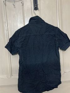 Black With Little Design On The Shirt