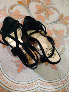 Black strappy heels