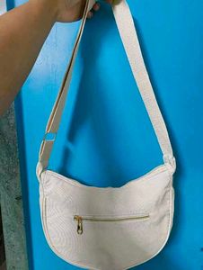 Cream-colored Slingbags