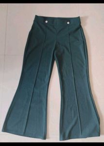 flared / bootcut dark green trousers pants