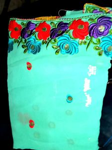 Elegant Turquoise Floral Saree