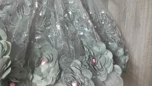 A Pink Frock With Cement Flowers