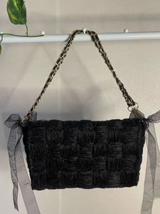 Chic Black Woven Clutch Bag with Chain Strap