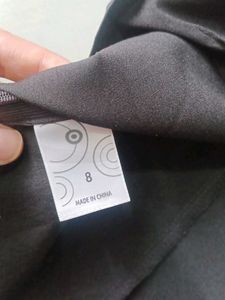 Black Sleeveless Surplice Top