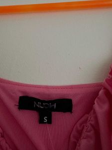 Pink bodycon dress with front slit