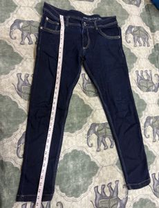 Combo of green shirt and denim jeans