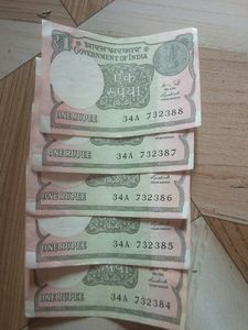 1 Rupee New Notes With Serial Numbers.