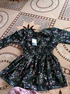 Black floral peplum top