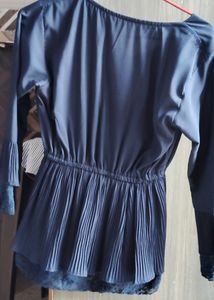 It Is A Very Good Looking Blue Colour Top And S