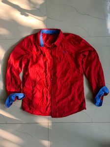 Red Shirt with Blue Accents