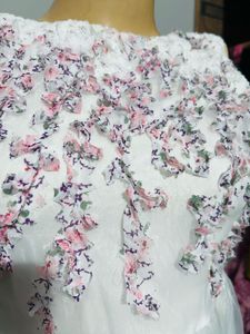 White dress with floral embroidery