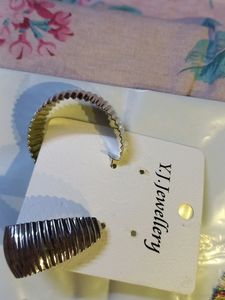 10 Pairs Of Earrings And 2 Finger Rings