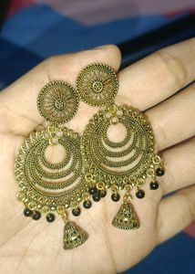 A Pair Of Traditional Style Earrings