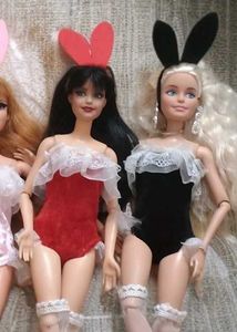 set of four bunny suits for dolls