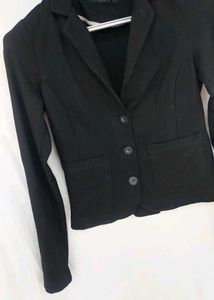 Black Blazer with Notched Lapels and Front Pockets