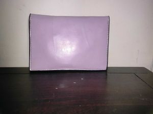 Sling Bag with Detachable Strap.
