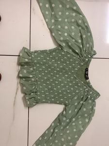 Ruched Stretchable Crop Top With Bell Sleeves In Sage Green Colour