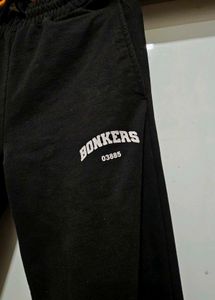 BONKERS corner BLACK WIDE-LEG SWEATPANTS