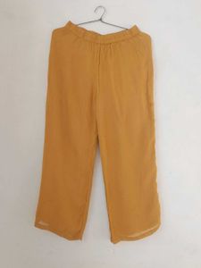 Hand Floral Embroidered Kurta pant set .