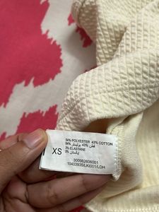 Off-White Colour Sleeveless Top
