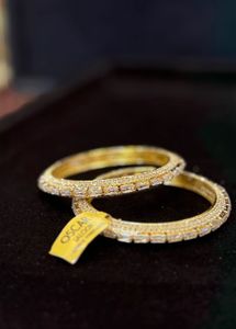 Oscar golden bangles