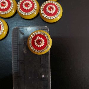 yellow and red diamond embellishment