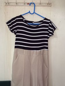 black nd white with beige colour jumpsuit