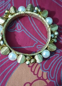 pearl and golden kada