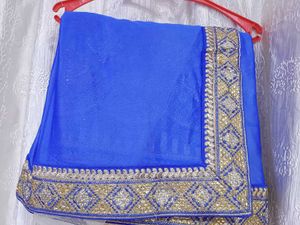 Half net saree with stiched blouse and peticoat