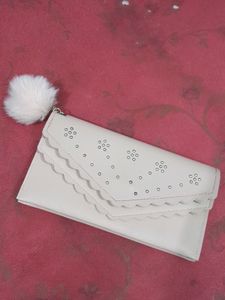 A Very Beautiful Handbag In Peach Colour