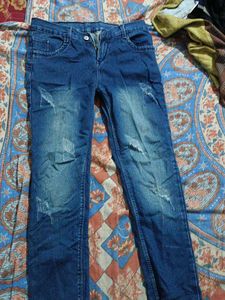 Ripped Blue Denim Jeans