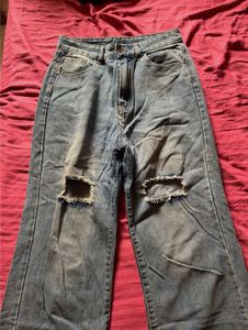 Flared Ripped Blue Jeans