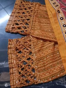 Mustard/Gold Pant And Off White Kurti.