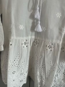 White Embroidered Peplum Top