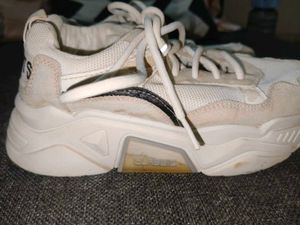 Vintage-Style Off-White Sneakers