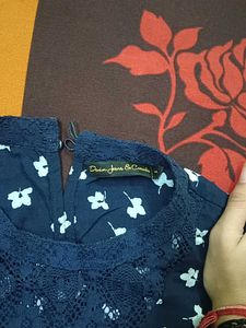 A Navy Blue Floral Top