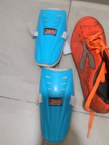 Orange Soccer Cleats with Guards
