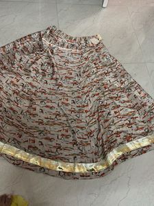 Patterned Skirt with Gold Trim
