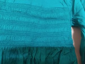 Turquoise Green Peplum Top With Pearl Design