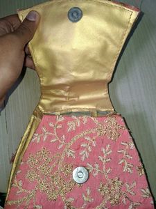 Elegant Pearl Handle Clutch