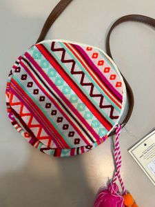 Astrid round Geometric print sling bag for women