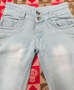 Light Blue Jeans With Criss Cross Design