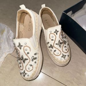 AJIO White Embellished Shoes